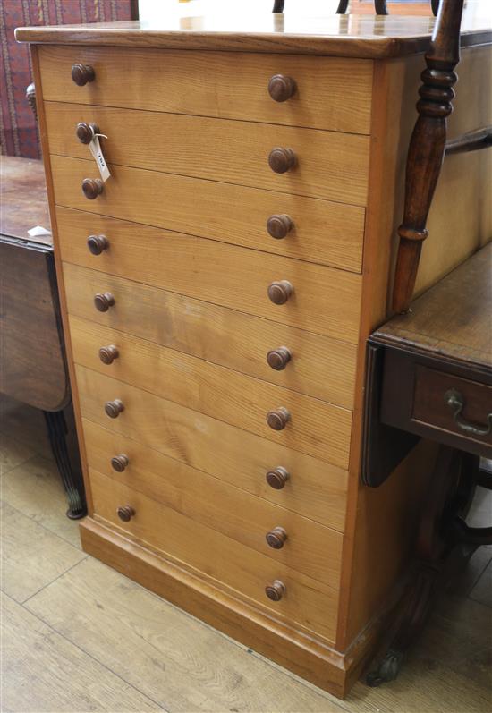 A light oak 9 drawer chest W.68cm